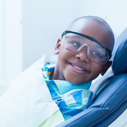 smiling boy waiting for dental exam